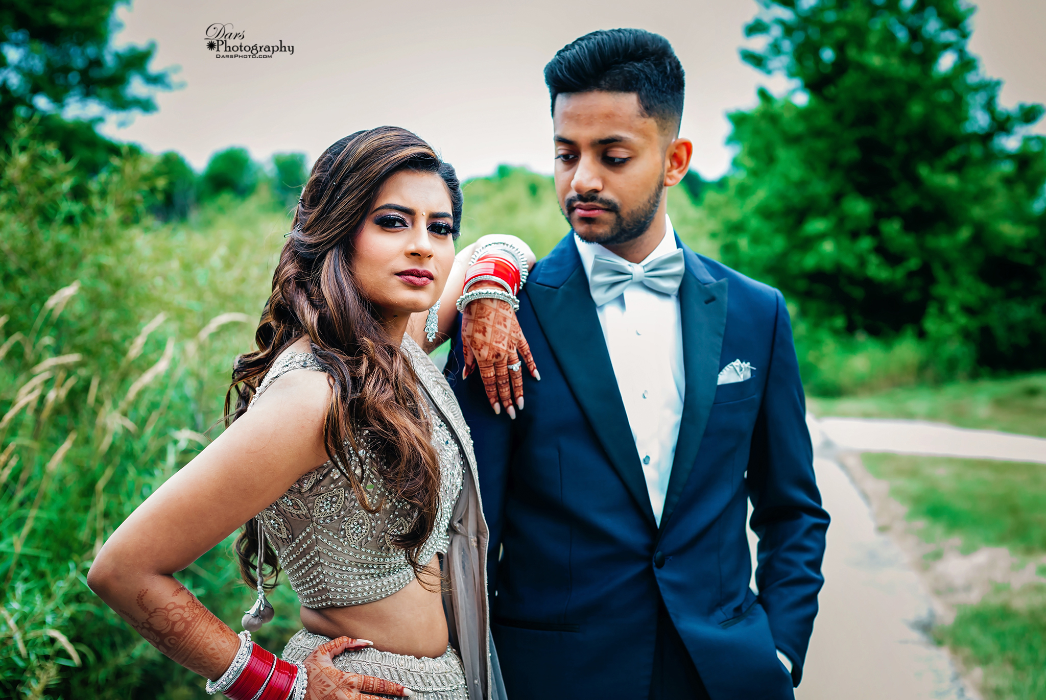 Portrait of an Indian wedding couple posing for album Stock Photo - Alamy